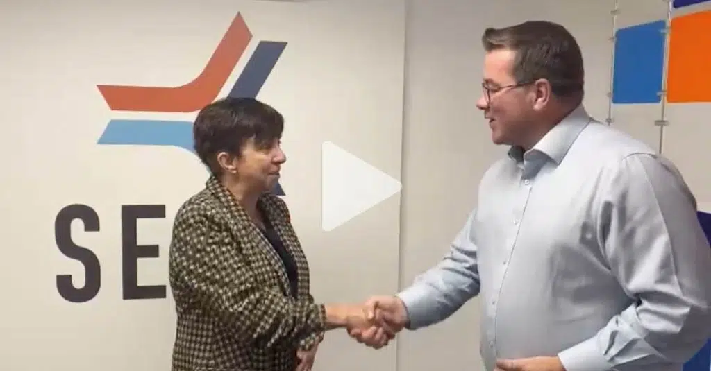 Tim and Nikki shaking hands in the SEP2 London Office